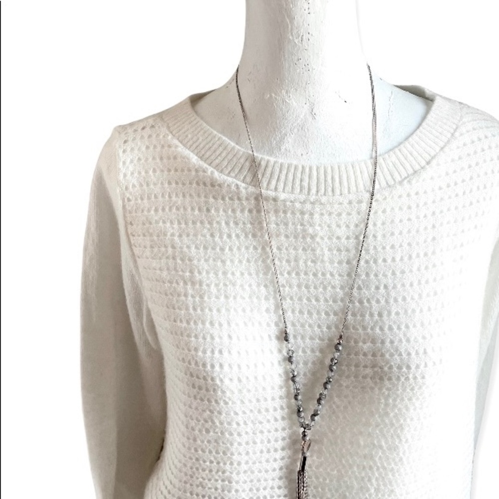 Women’s sweater with faux silk shirt hem